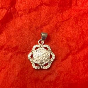 5/$25 Faux pendant: silver with diamond chips. Costume Jewelry.